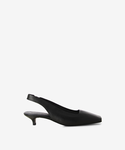 Black leather pumps by S Sempre Di. It has an elastic slingback strap and features an open peep toe with a kitten heel and a soft square toe.