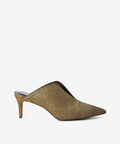 Brown pony hair leather mules by Sempre Di. It is a slip-on style and features a split upper, stiletto heel, and a pointed toe.
