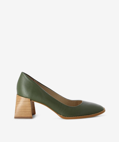 Green leather court shoes by Brazilio. It is a slip on style and features a contoured block heel and a round toe.