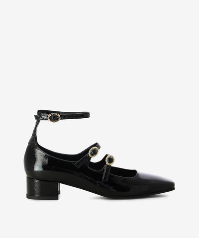 Black patent leather Mary-Janes by Sempre Di. It features 3 straps with adjustable pin-buckle fixtures, low block heel, and a chisel toe.