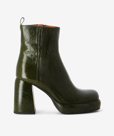 Olive green crinkled leather ankle boots with an inner zip fastening and features a pull tab, platform sole, chunky block high heel and a square toe.
