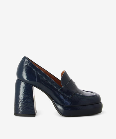 Blue leather loafers with a slip-on style and features a crinkled leather with a high block heel, platform sole and a square toe.