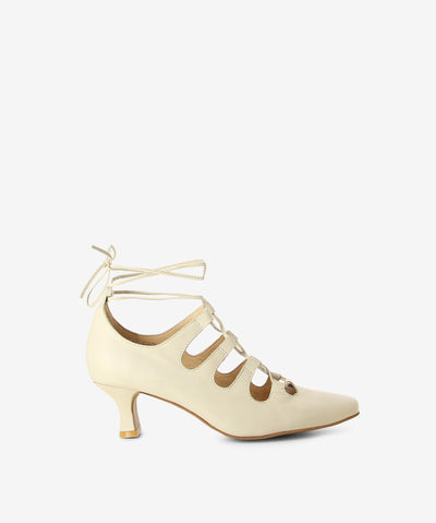 Beige leather heels by Django & Juliette. It has an ankle tie fastening and features lace up strappy and a pointed toe.