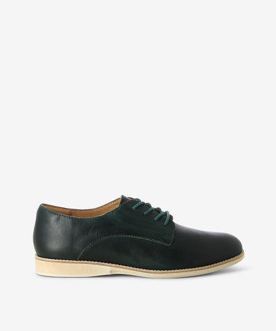 Dark green vintage-look leather derby shoes by Rollie. It has lace-up fastening and features a round toe. Each pair in this colour varies slightly due to the vintage look leather.