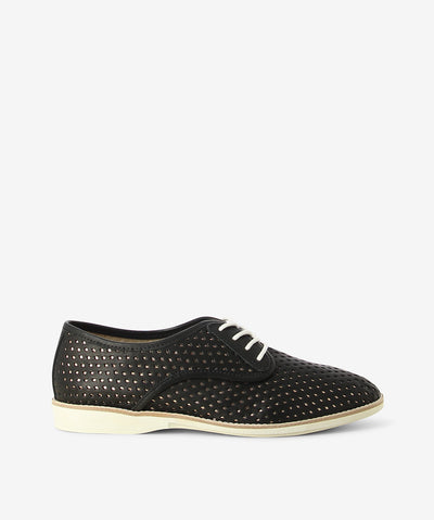 Black and rose gold leather derby shoes by Rollie. It has a lace-up fastening and features a perforated layered upper, low contrast sole and an almond toe.