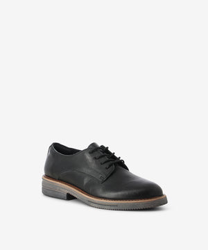 Black vintage-look leather derby shoes by Rollie. It has a lace-up fastening and features a mid-height cushioned sole, and a round toe. Each pair in this colour varies slightly due to the vintage look leather.
