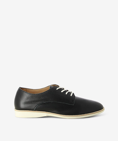 Black leather derby shoes by Rollie. It has a lace-up fastening and features a grained upper, low contrast sole and an almond toe.
