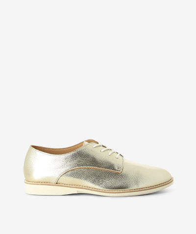Gold metallic leather derby shoes by Rollie. It has a lace-up fastening and features a grained upper, low contrast sole and an almond toe.