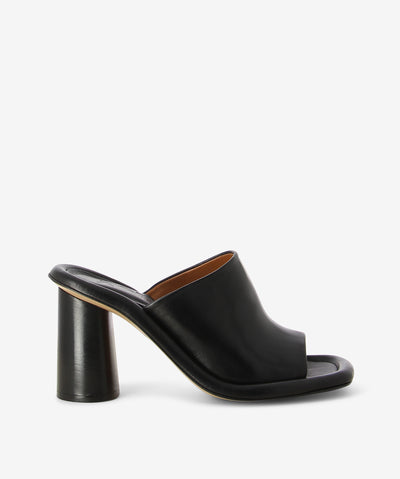 Black leather heels with a slip-on style and features an outer cushioned insole, block heel and a soft square toe. 
