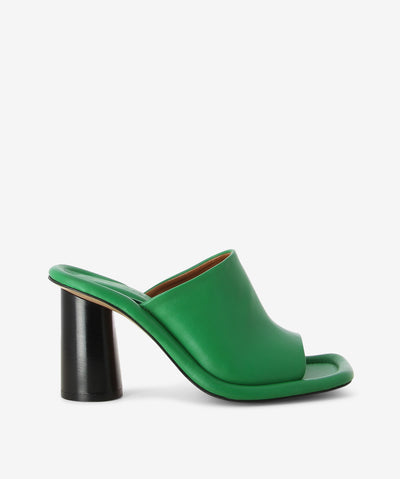 Green leather heels with a slip-on style and features an outer cushioned insole, block heel and a soft square toe. 