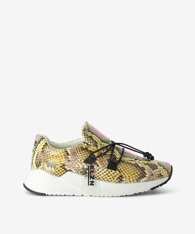 Yellow snakeskin print leather sneakers by Elvio Zanon. It has a lace-up fastening with toggle fixture, chunky platform and an almond toe.