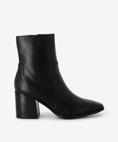 Black leather boots by EOS. It features a side zipper closure, block heel, and a soft pointed toe.