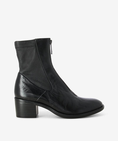 Black worn-look leather ankle boots by Django & Juliette. It features a combination stretch leather upper, centered front zipper, and a round toe.