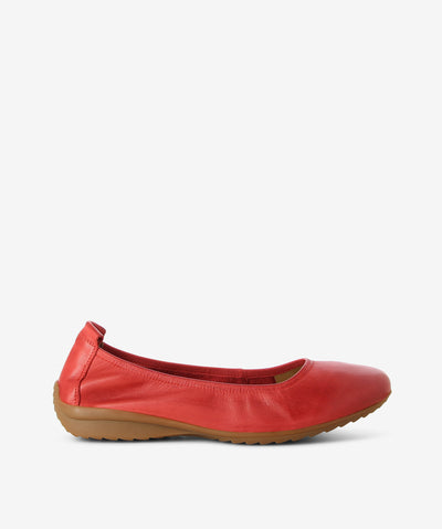 Red leather ballet flats by Martini Marco. It features an elasticated upper, rear pull tab, and a round toe.