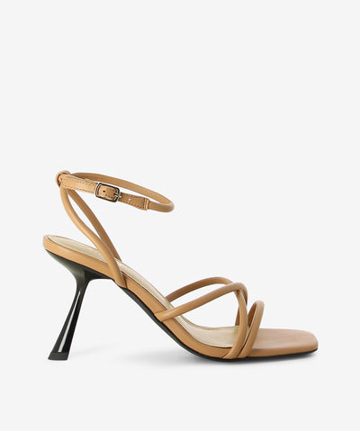 Soft tan leather heeled sandals by Siren. It has an ankle buckle fastening and features crossed strappy upper, slated heel and an open square toe.