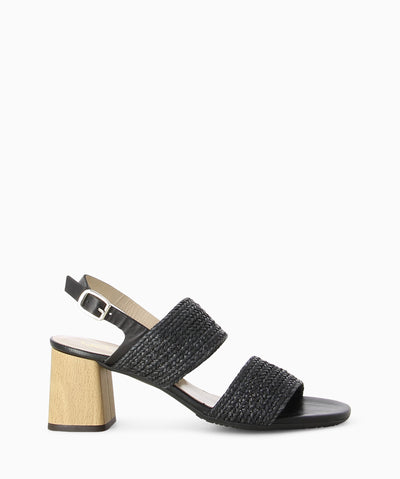 Black woven heeled sandals with a woven upper, block heel and a round toe.