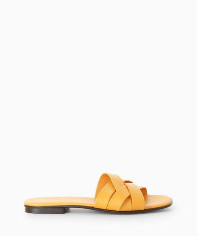 Mango leather slides with a low block heel, interwoven crossover straps and a soft square toe.