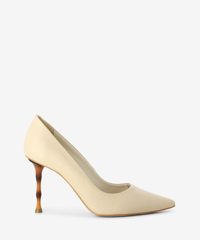 Vanilla leather pumps featuring a bamboo stiletto heel and a pointed toe.