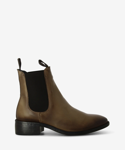 Taupe leather Chelsea boots featuring elastic gussets, pull tabs and a low stacked heel.