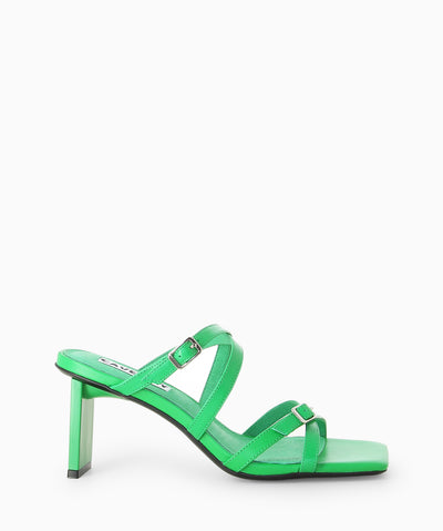 Green leather mules featuring a strappy upper with buckle detailing, a slender heel and a square toe.