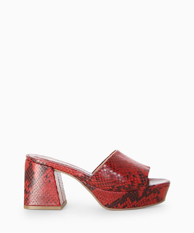 Red leather platform mules with snakeskin embossed upper, block heel and a round toe.