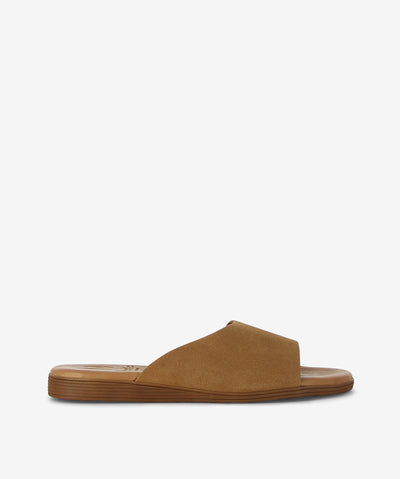 Step into effortless style with the Marilla 1423 slide — a simple yet striking design made in Spain with care. This easy slide features a wide textured tan (taupe) strap that adds a cool, modern touch to any outfit. Designed with a soft blue front strap with subtle texture, a smooth brown sole for everyday comfort, a round toe for a relaxed fit, and a flat profile for easy wear all day long.