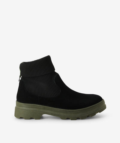 Black and green suede boots by Martini Marco. It has an elongated elastic gusset with a metal ring pull tab, chunky tread sole, and a round toe.