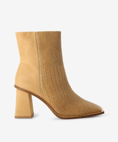 2-toned camel boots by Brazilio. It features a croc skin like front finish, contrasting suede back and heel, and a square toe.