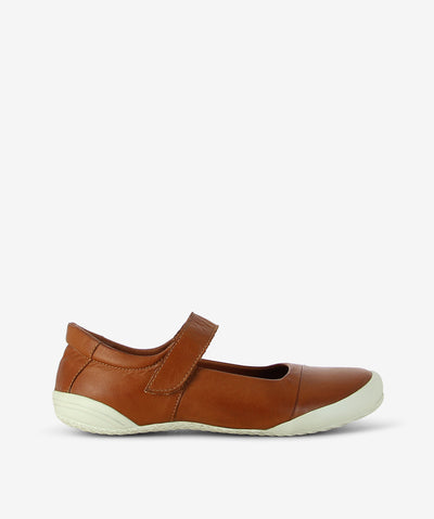 Classic charm meets modern comfort in the Marco Martini 765.03 by Martini Marco Tan Mary Jane. Elegant, practical, and designed for all-day wear, it’s perfect for the woman who loves style without compromise.

Features &amp; Materials:

Soft premium tan leather upper with velcro upper strap
Sleek rounded toe and streamlined silhouette with tonal contrast stitching
Flexible white rubber sole for stability and all-day comfort