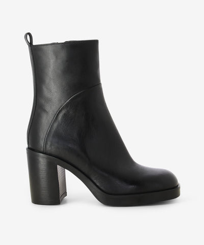 Black Italian leather ankle boots by Strategia. It has an inner zip fastening and features a paneled upper, rear pull tab, and a round toe.