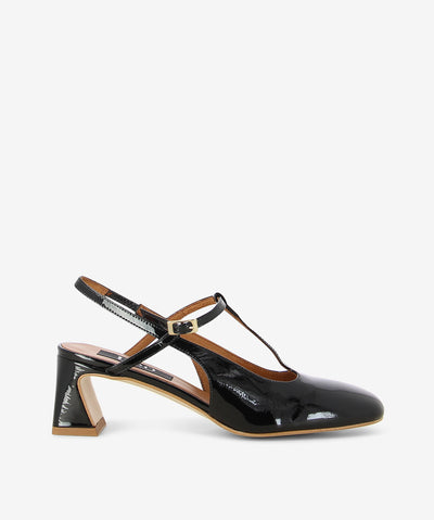 Black crinkle patent leather heels by Neo. It features a tapered block heel, slingback and T-bar straps with an adjustable pin-buckle closure, and a round toe.