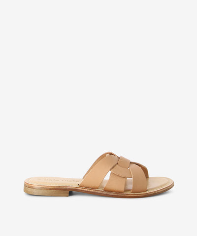 Nude leather slides with a slip-on style and features an interwoven upper, low stacked heel and a round toe.