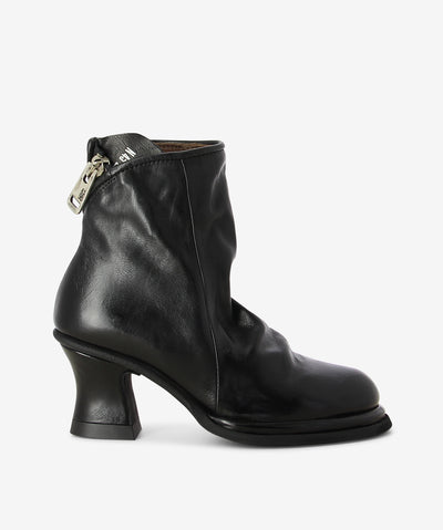 Black leather boots by Sempre Di by A.S.9.8. It features a wrap around zipper fastening with am extended facing, tapered heel, and a round toe.
