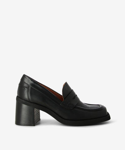 Black leather loafers with a slip-on style and features a high stacked heel and a square toe.