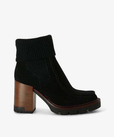 Black folded knit suede Chelsea boots with a pull-on style and features knitted elastic gussets with a block heel, rubber sole and a round toe.