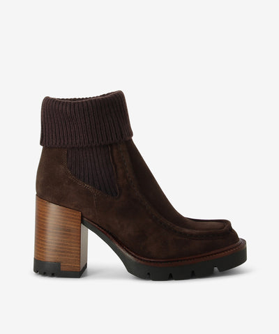Dark brown folded knit suede Chelsea boots with a pull-on style and features knitted elastic gussets with a block heel, rubber sole and a round toe.