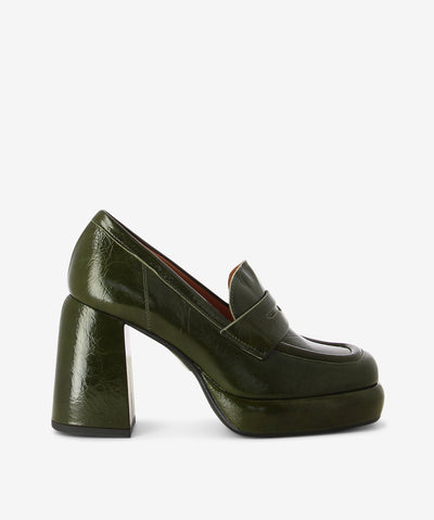 Olive green leather loafers by ZOMP. The 'Bates' is a slip-on style and features a crinkled leather with a high block heel, platform sole and a square toe.