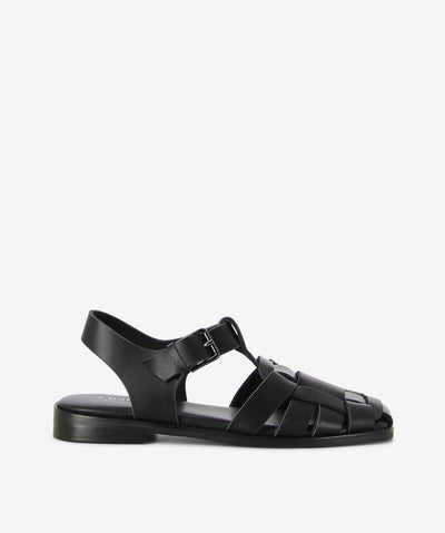 Black leather fisherman style sandals by 2 Baia Vista. It features a soft interwoven upper with an adjustable pin-buckle fixture, padded footbed, and a soft square toe.