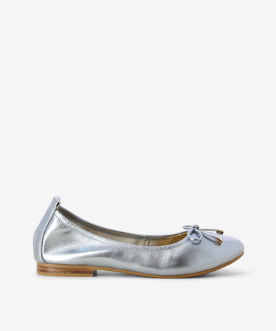 Blue metallic leather flats by 2 Baia Vista. It is a slip on style and features a bow embellishment on the toe, low block heel, and a round toe.