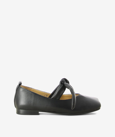 Black leather flats by 2 Baia Vista. It features soft leather tie-up straps, a low block heel, and a contoured square toe.