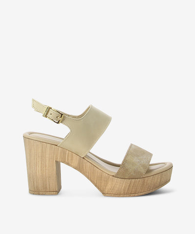 Beige platform leather sandals by Origini Studio. It features ankle buckle strap with an adjustable pin-buckle fixture, chunky platform sole, and almond toe.