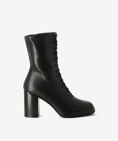 Black leather lace-up boots with a lace-up style and features an inner zip, block heel and a soft square toe.