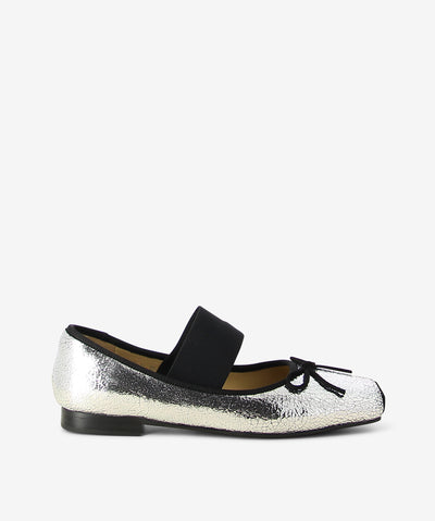 Silver crackle metallic leather flats by 2 Baia Vista. It is a slip on style and features an elastic upper strap, bow detail, and a contrasting square toe.