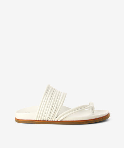 White leather sandals by EOS. It has a leather post with straps and features a multi-strap leather upper, an ergonomic footbed, and a tapered rounded toe.