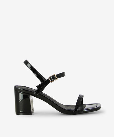 Meet Daisy by 2 Baia Vista your go-to heel with a modern essential—crafted in Black patent leather and finished with a buttery-soft nappa leather insole for elevated comfort. Slim toe strap and adjustable ankle buckle fastening, slingback silhouette for a modern, breathable fit, sculptural block heel for statement stability and square open toe.