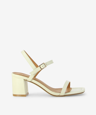 Meet Daisy by 2 Baia Vista your go-to heel with a modern essential—crafted in Off White leather and finished with a buttery-soft nappa leather insole for elevated comfort. Slim toe strap and adjustable ankle buckle fastening, slingback silhouette for a modern, breathable fit, sculptural block heel for statement stability and square open toe.