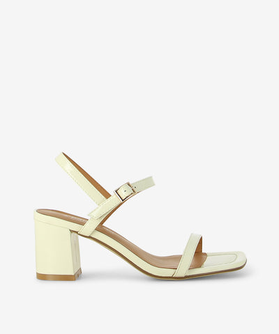 Meet Daisy by 2 Baia Vista your go-to heel with a modern essential—crafted in Off White patent leather and finished with a buttery-soft nappa leather insole for elevated comfort. Slim toe strap and adjustable ankle buckle fastening, slingback silhouette for a modern, breathable fit, sculptural block heel for statement stability and square open toe.