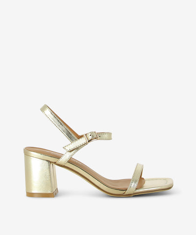 Meet Daisy by 2 Baia Vista your go-to heel with a modern essential—crafted in metallic gold leather and finished with a buttery-soft nappa leather insole for elevated comfort. Slim toe strap and adjustable ankle buckle fastening, slingback silhouette for a modern, breathable fit, sculptural block heel for statement stability and square open toe.