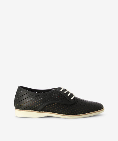 Black leather derby shoes by Rollie. It has a lace-up fastening and features a perforated upper and an almond toe.