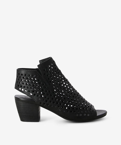 Black leather heeled sandal by Elvio Zanon. It has a perforated leather upper, side zipper, and a rounded toe.